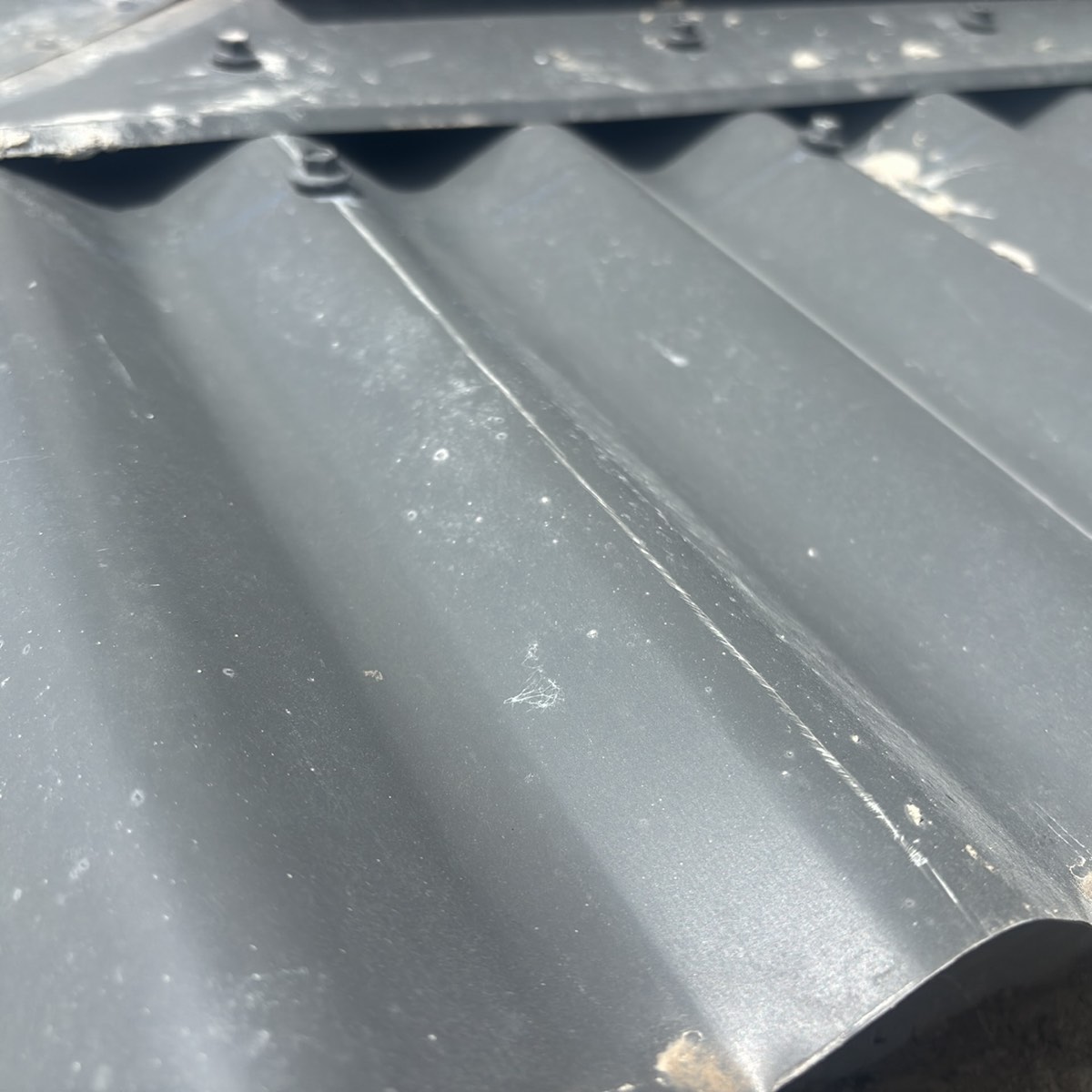 Damaged, scratched or dented roof cladding, recorded on a pre-handover inspection in Craigieburn