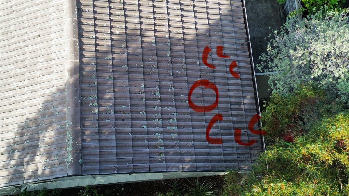 Cracked and broken roof tiles, recorded during a pre-purchase inspection in Craigieburn